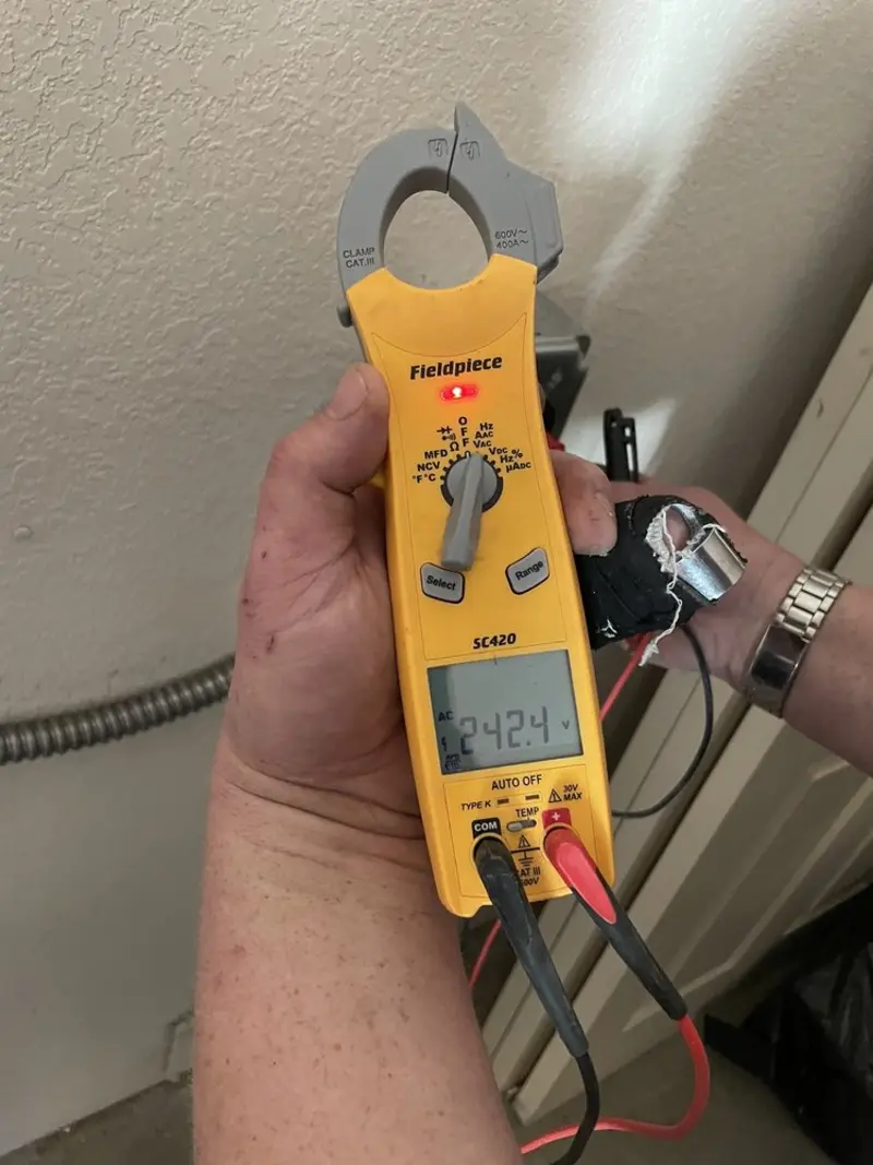 Voltage testing with clamp meter during Circuit Breaker Repair in Madill